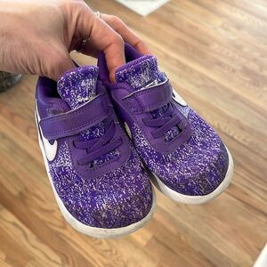 Purple Nike tennis shoes